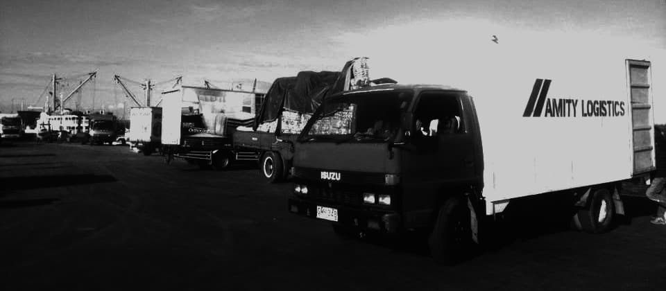 Amity Logistics Express trucks lined up at Cebu City Port